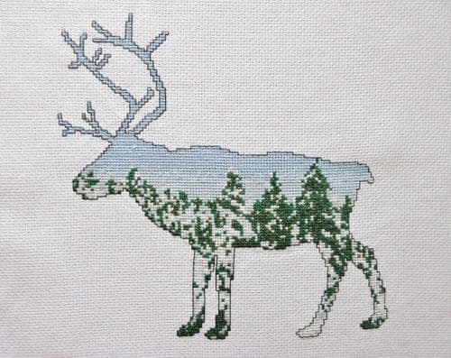 Climbing Goat Designs Arctic Reindeer printed cross stitch chart