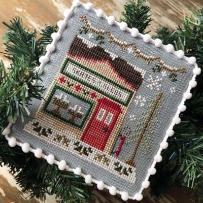 Country Cottage Needleworks Skate and Sled Shop - Snow Village cross stitch chart
